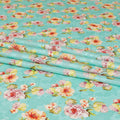Vista blue uragiri cotton voile fabric with same tone jacquard having olive green, cerise pink, peach and off white print in floral design-D7342 Regal Fabrics