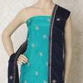 Turquoise blue silk kameez with gold embroidery having sequin work and bead work in floral design. Navy blue plain salwar having same tone chiffon dupatta with gold bead work-D12697 Regal Fabrics