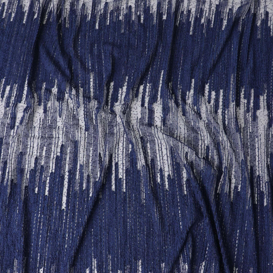 Indigo blue nylon tulle fabric with same tone embroidery in fancy design