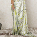 Off white Premium pure silk satin saree with lemon yellow, black, grey tie & die print having stone work in fancy design-12566 Regal Fabrics
