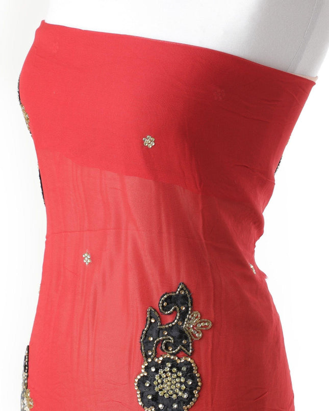 قماش تول نايلون أحمر من الطوب الناري مع قطيع مخملي أسود به خرز ذهبي وأعمال حجرية بتصميم الأزهار