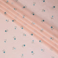 Peach cotton voile fabric with sapphire blue, olive green and powder blue embroidery in floral design-D11086