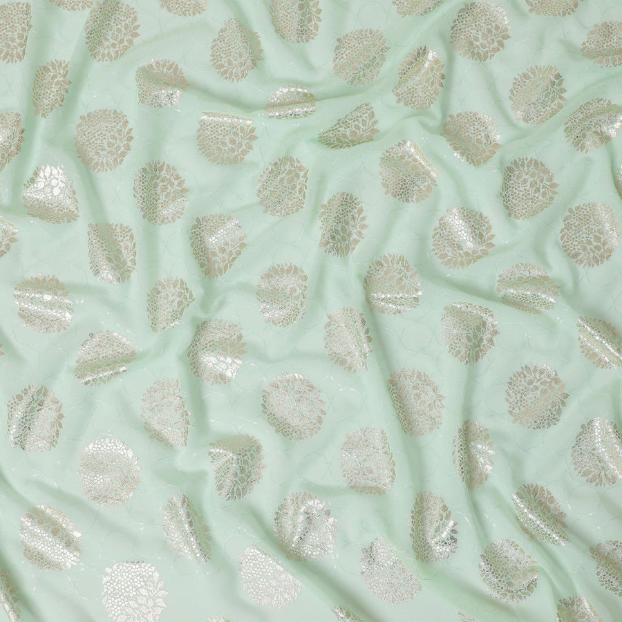 Mint green synthetic georgette fabric with same tone embroidery having gold foil printed in floral design-D12228