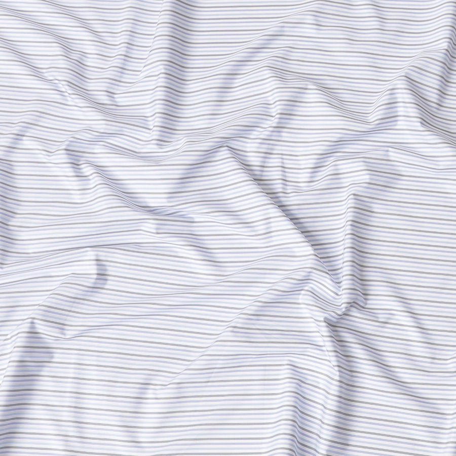 White blended Cotton shirting fabric with black, blue and baby blue print in stripe design-D6354