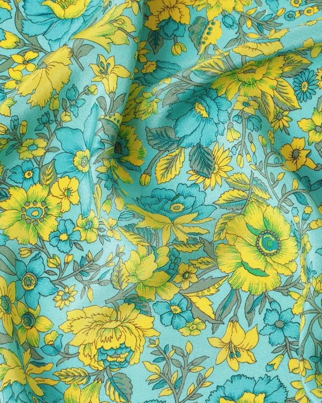 Turquoise blue silk crepe fabric with yellow, green and blye prints in floral design - D9911 Regal Fabrics