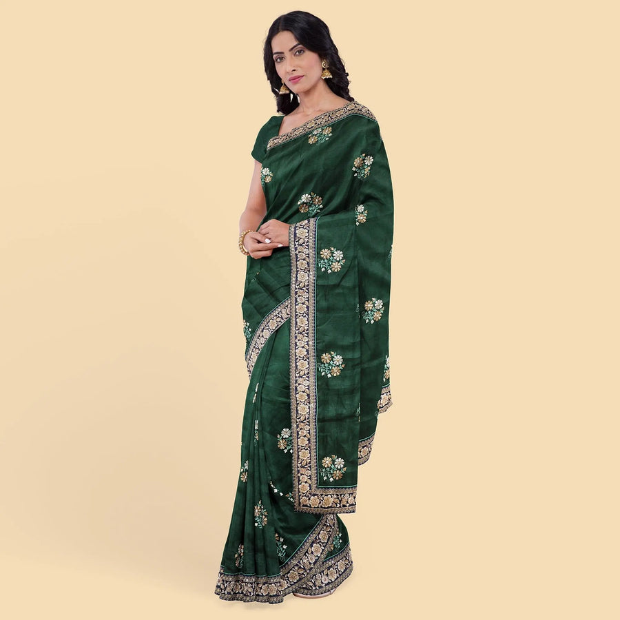 Pine green synthetic tusser fabric with multi colour embroidery in floral design. Blouse piece in same colour-D12745 Regal Fabrics