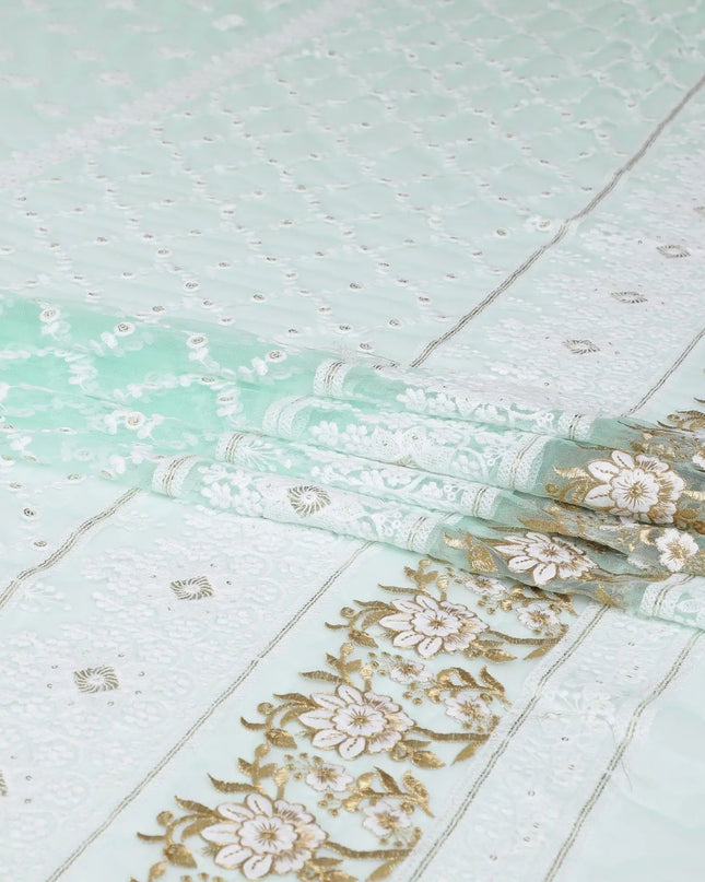 Turquoise blue nylon tulle fabric with white and gold embroidery having gold sequins in fancy design-D6903 Regal Fabrics