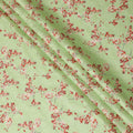 Lime green uragiri cotton voile fabric with same tone jacquard having barn red and black print in floral design-D14325 Regal Fabrics