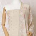 Light beige silk georgette kameez with multicolor embroidery, bead work and sequin work in floral design. Light beige plain salwar with same tone georgette dupatta having multicolor embroidery and stone work-D15523 Regal Fabrics