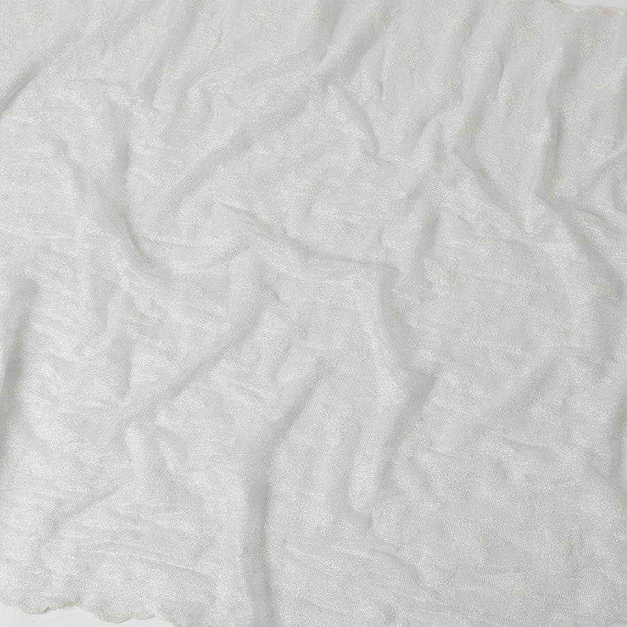 Metallic silver soft nylon tulle fabric with same tone self design in floral design