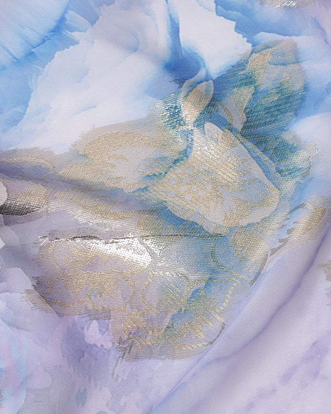 Maya blue synthetic chiffon fabric with same tone and lavender print having gold metallic lurex in floral design-D7004