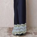 Dark navy blue blended cotton lawn fabric with baby blue, blonde yellow border guipure embroidery having stone work in fancy design-D14724 Regal Fabrics