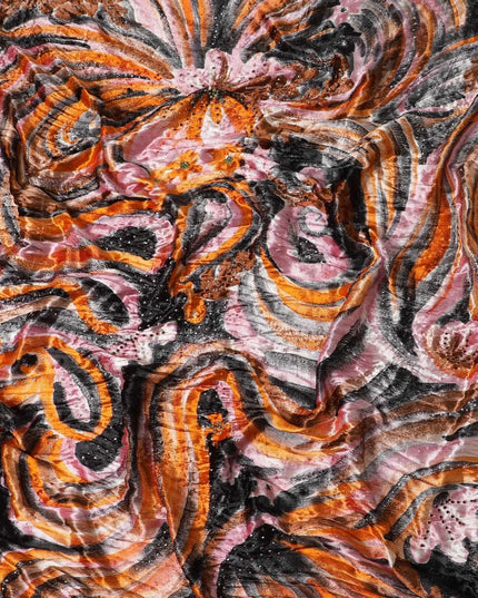 Black and orange Rayon velvet fabric with metallic silver studs and ruby red stones in abstract design