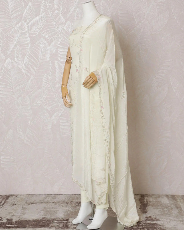 Cream Premium pure silk crepe kameez with multicolor bead and sequin embroidery in floral design. Cream plain salwar having same tone chiffon dupatta with multicolor bead and sequin embrodiery-D15003 Regal Fabrics
