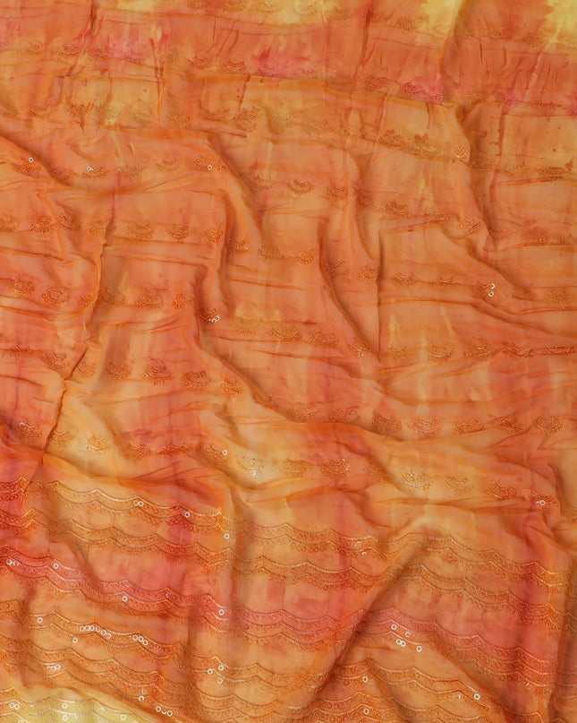 Tangerine orange & light yellow synthetic chiffon fabric with transparent sequins and embroidery in abstract design Regal Fabrics