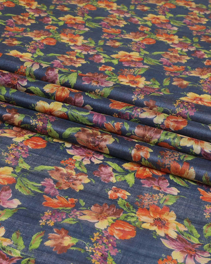 Petrol blue tussar silk fabric with olive green, tangerine orange, blonde yellow and light plum print in floral design-D6140 Regal Fabrics