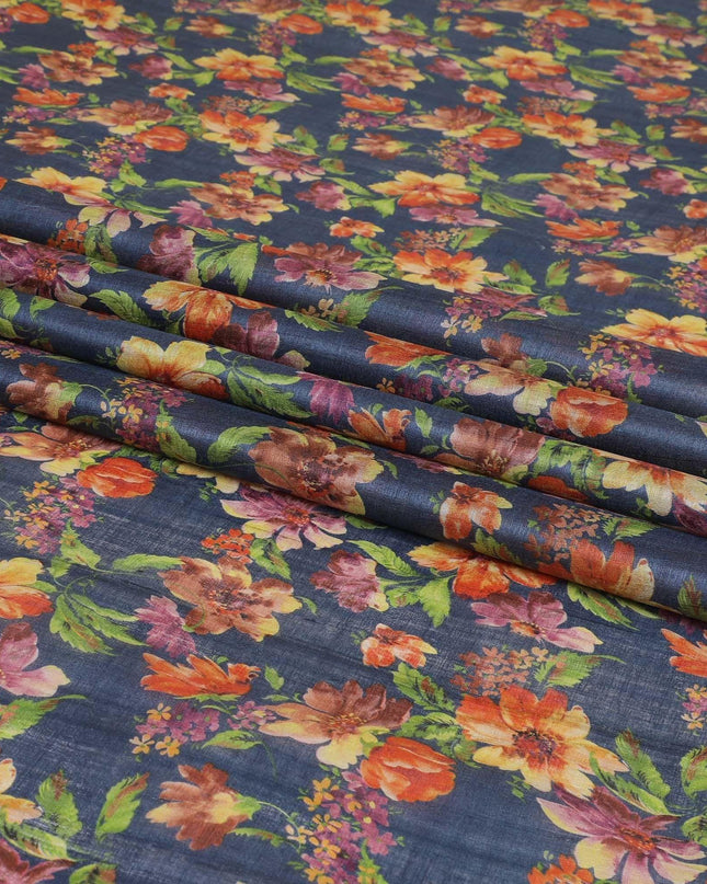 Petrol blue tussar silk fabric with olive green, tangerine orange, blonde yellow and light plum print in floral design-D6140 Regal Fabrics