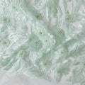 Mint green nylon tulle fabric with same tone embroidery having stone work in floral design-D11708
