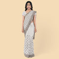 Cloud grey synthetic chanderi silk saree with embroidery & stones in floral design. Blouse piece in same colour-D12748