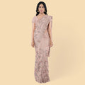 Peach synthetic crepe saree with multi colour embroidery & stones in floral design. Blouse piece in same colour-D12750 Regal Fabrics