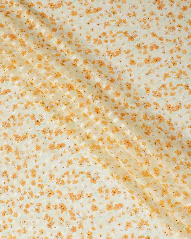 Blonde yellow uragiri cotton voile fabric with same tone jacquard having peach and turquoise green print in clip cord design-D14210