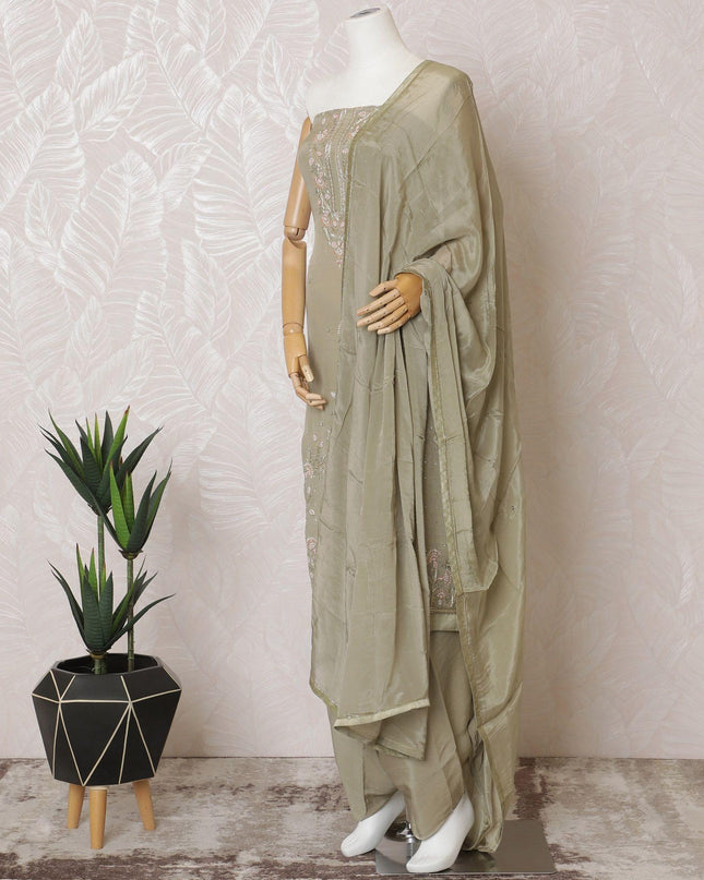Artichoke green Premium pure silk crepe kameez with same tone embroidery, stone work and bead work in floral design. Artichoke green Plain salwar with same tone chiffon dupatta having same tone embroidery and stone work-D15570