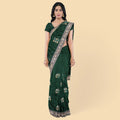Pine green synthetic tusser fabric with multi colour embroidery in floral design. Blouse piece in same colour-D12745 Regal Fabrics
