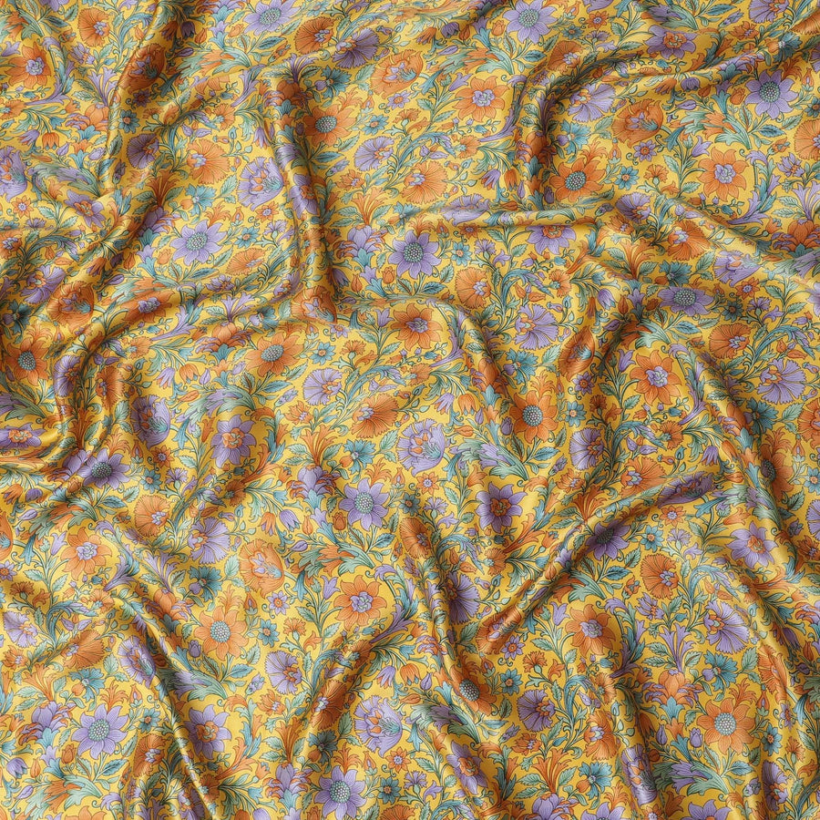 Honey yellow silk satin fabric with green, orange & violet prints in floral design-D11143