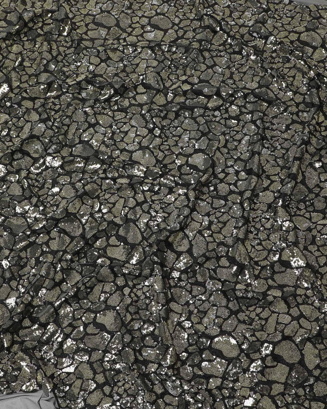 Black nylon tulle fabric with black, gold and silver sequins in abstract design