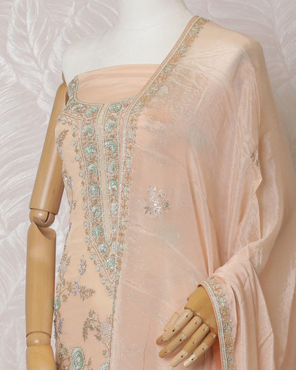 Light peach Premium pure silk crepe kameez with mint green embroidery, sequin work and stone work in floral design. Light peach plain salwar with same tone chiffon dupatta with same tone embroidery and bead work-D15577