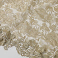 Honeysuckle beige nylon tulle fabric with floral embroidery and fancy border in floral design