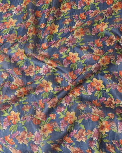 Petrol blue tussar silk fabric with olive green, tangerine orange, blonde yellow and light plum print in floral design-D6140 Regal Fabrics