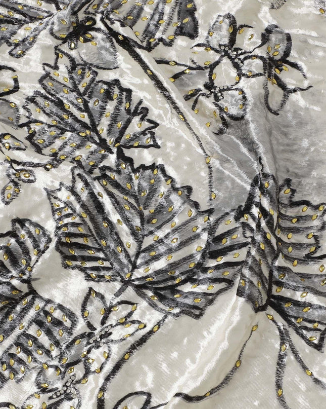Macaroon Beige Rayon velvet fabric with charcoal grey print having green and silver stonework in leaf design Regal Fabrics