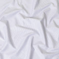 White 100%  cotton shirting fabric with blue dots in self design-D7409 Regal Fabrics