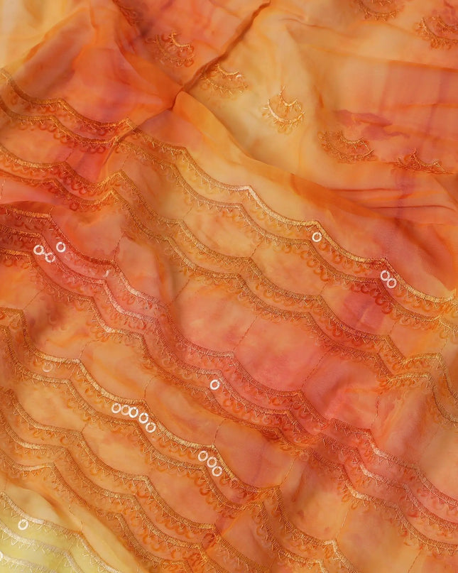 Tangerine orange & light yellow synthetic chiffon fabric with transparent sequins and embroidery in abstract design Regal Fabrics