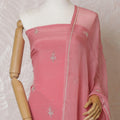 Salmon pink Premium pure silk crepe kameez with bead work, sequin work and stone work in floral design. Salmon pink plain salwar with same tone chiffon dupatta with same tone embroidery and bead work-D15579