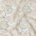 Beige nylon tulle fabric with same tone embroidery having baby blue bead work and peach sequins in floral design-D15168