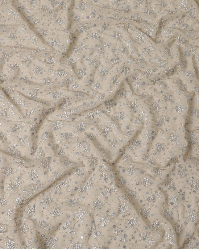 Parmesan Beige fabric with beige embroidery and silver glitters in floral design Regal Fabrics