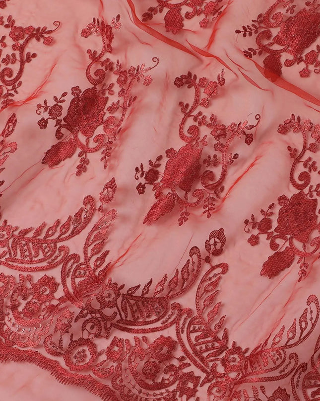 Rose red synthetic organza fabric with same shade embroidery in fancy design Regal Fabrics
