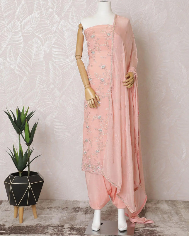 Salmon peach silk crepe kameez with same tone, vista blue embroidery, bead work and sequin work in floral design. Salmon peach plain salwar with chiffon dupatta having with same tone embroidery and bead work-D15531 Regal Fabrics