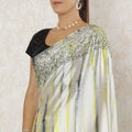 Off white Premium pure silk satin saree with lemon yellow, black, grey tie & die print having stone work in fancy design-12566 Regal Fabrics