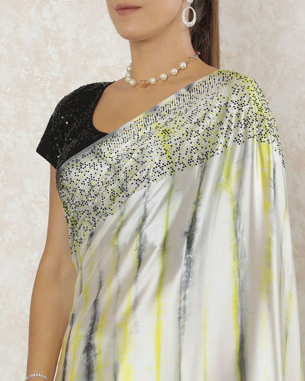 Off white Premium pure silk satin saree with lemon yellow, black, grey tie & die print having stone work in fancy design-12566 Regal Fabrics