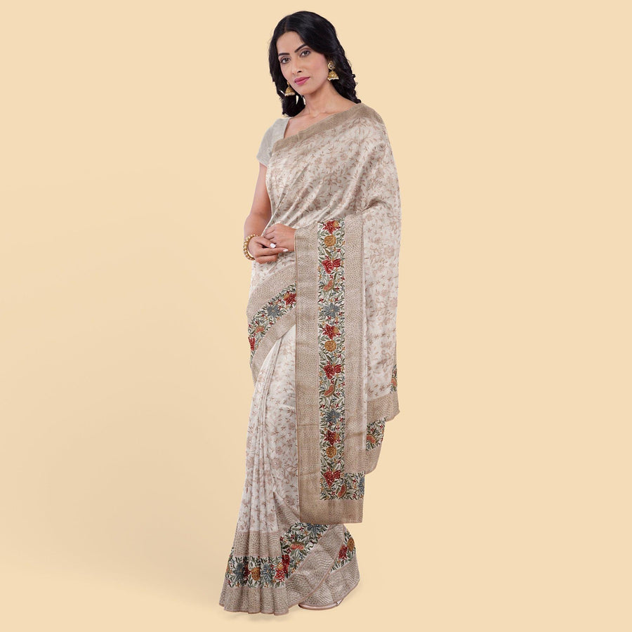 Oyster pink synthetic chiffon saree with multicolor embroidery, sequins and stone work in floral design. Same color blouse piece-D12758