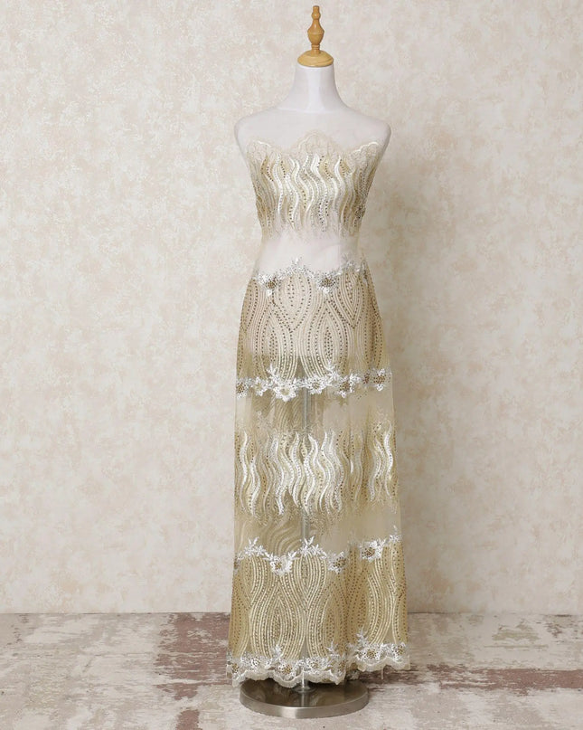 Gold nylon tulle fabric with  same tone, off white embroidery having stone work in abstract design-D14422 Regal Fabrics