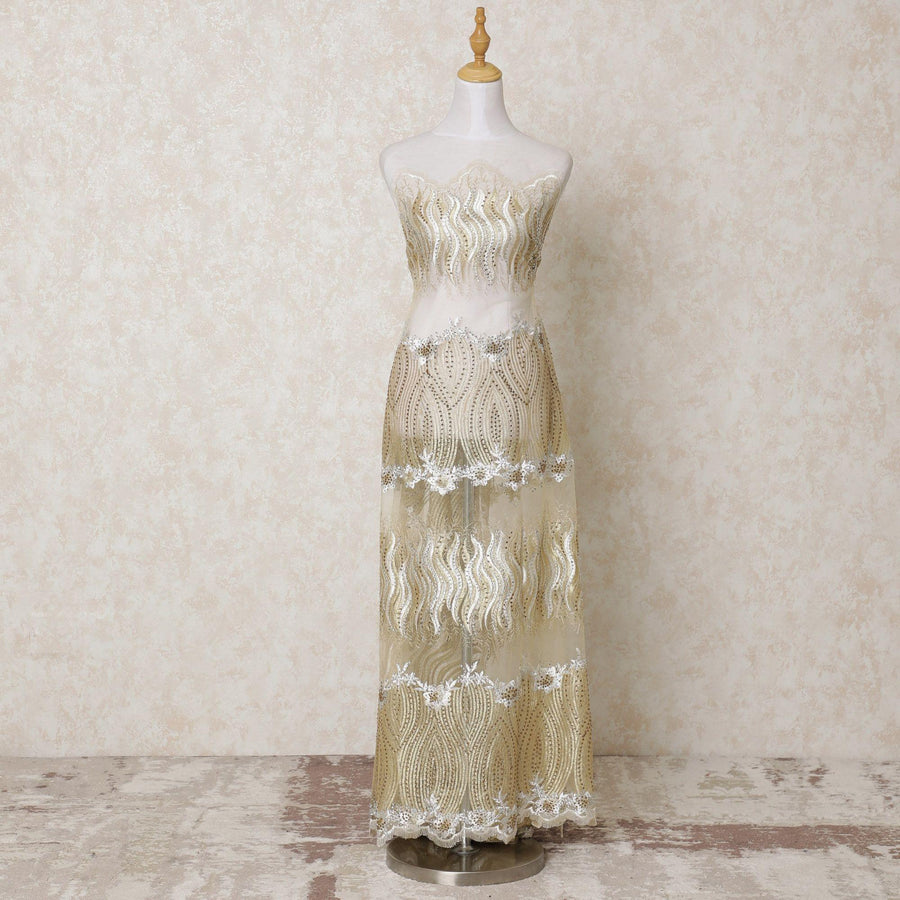 Gold nylon tulle fabric with  same tone, off white embroidery having stone work in abstract design-D14422