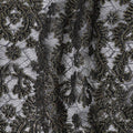 Black nylon tulle fabric with gold embroidery in fancy design