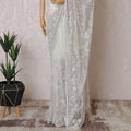 White Premium tulle saree with same tone embroidery having lavender sequin work and bead work in floral design-D15584
