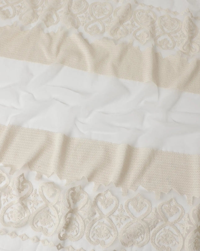 Off white soft nylon tulle fabric with cream color thread embroidery in floral design Regal Fabrics