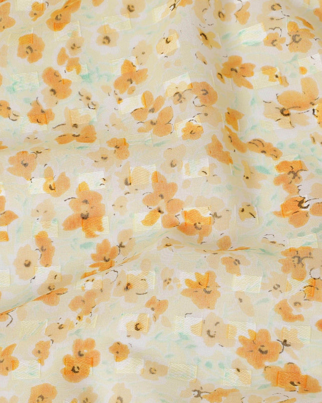 Blonde yellow uragiri cotton voile fabric with same tone jacquard having peach and turquoise green print in clip cord design-D14210