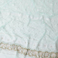 Turquoise blue nylon tulle fabric with white and gold embroidery having gold sequins in fancy design-D6903